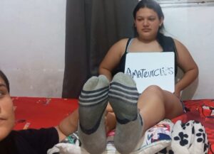 ELIZA FEET UP ON BED
